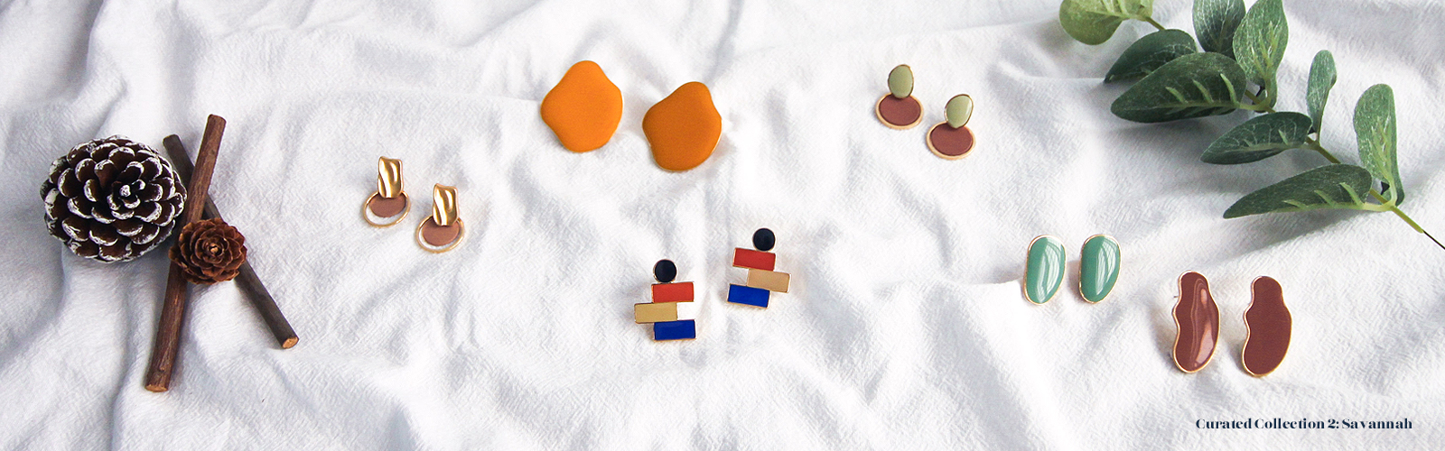 Flat lay shot of all Collection 2's curated earrings